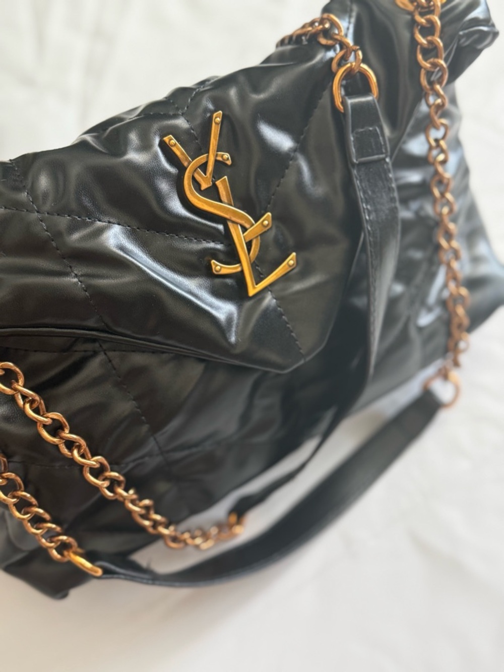 Black quilted faux leather bag